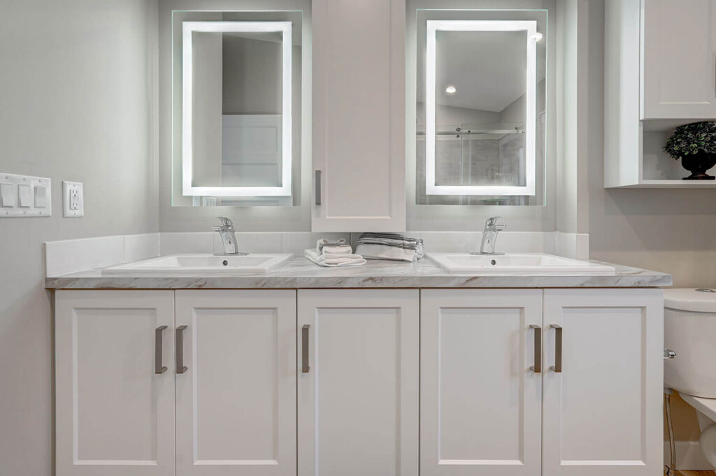 Modern double vanity with LED backlit mirrors