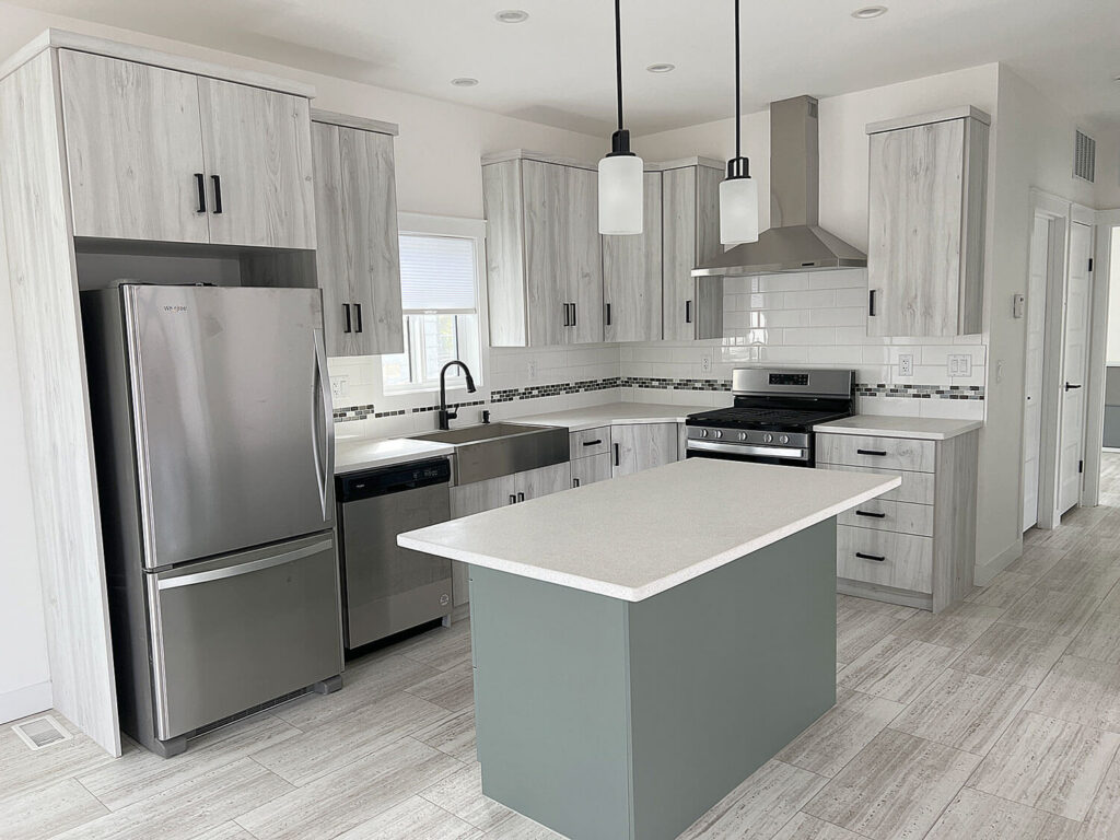 Kitchen with island workspace and pendant lighting