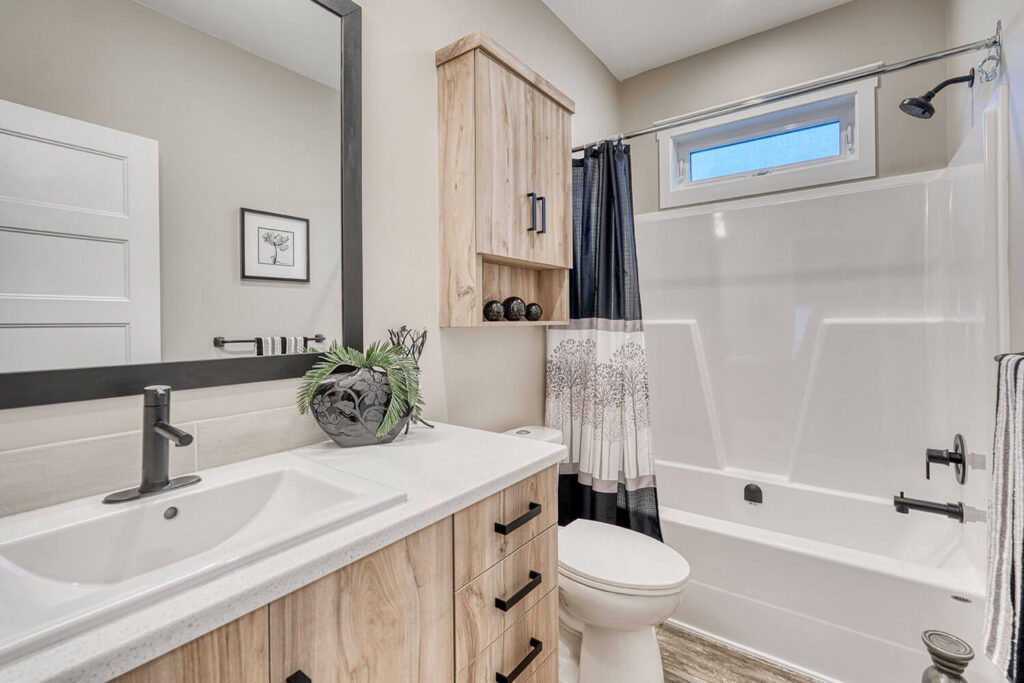 Spacious bathroom with quality tile and fixtures
