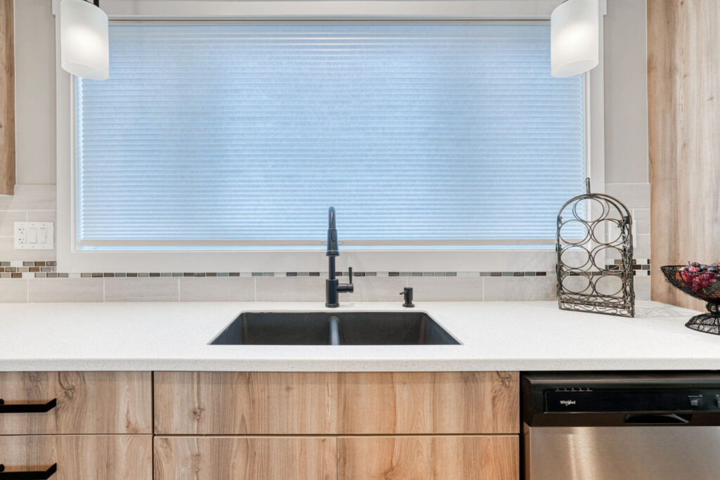 Statement black sink with modern faucet